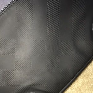 Burberry cosmetic bag.